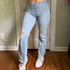 Flare jeans with rips